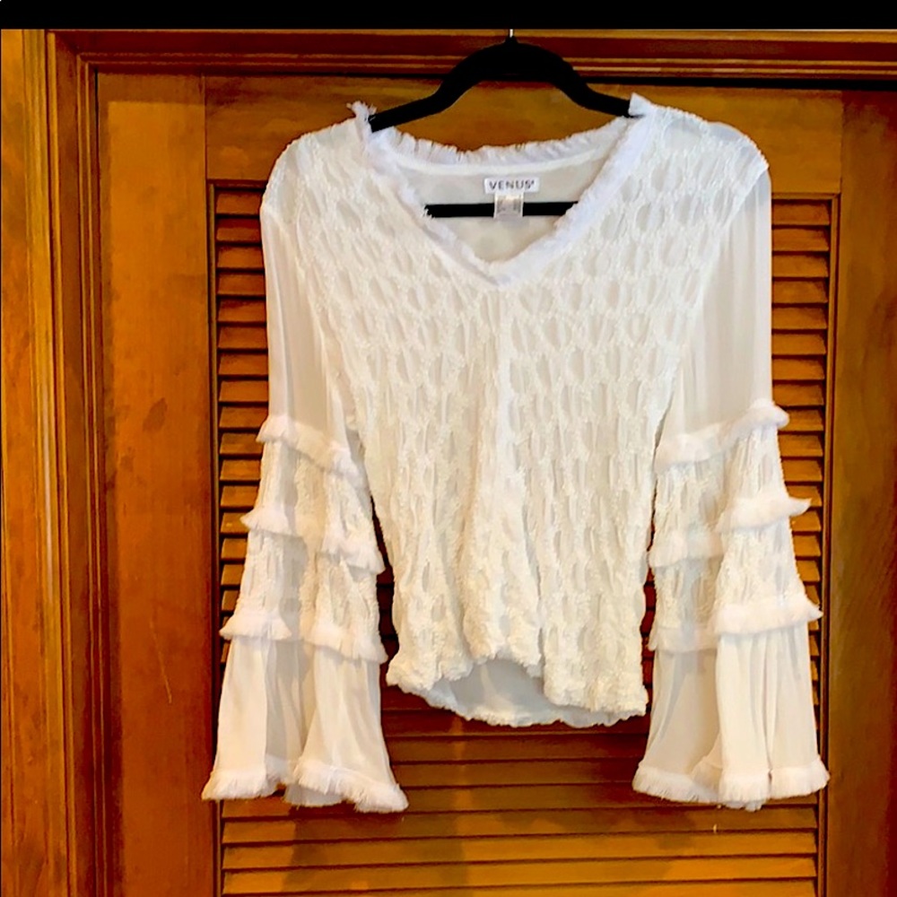 New w/o tag, white puckered, bell sleeve sexy top. L = 21” W = stretches to 19”